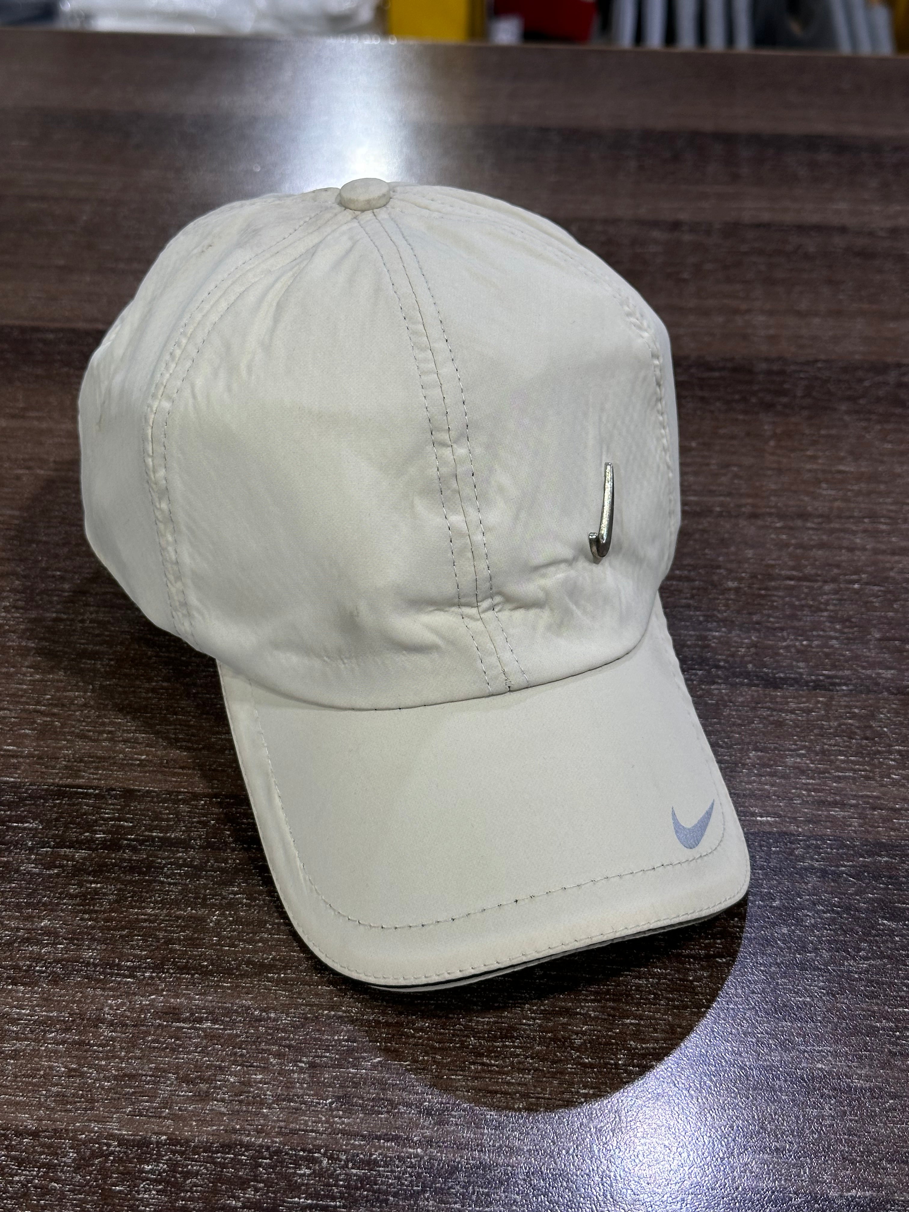 Nike tick cap best sale